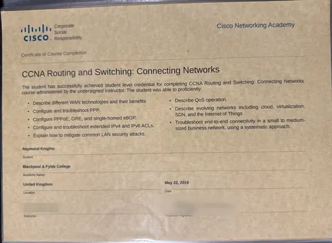 My Cisco Networking Academy course completion certificate for CCNA Routing and Switching: Connecting Networks, with the instructor's name and signature blurred